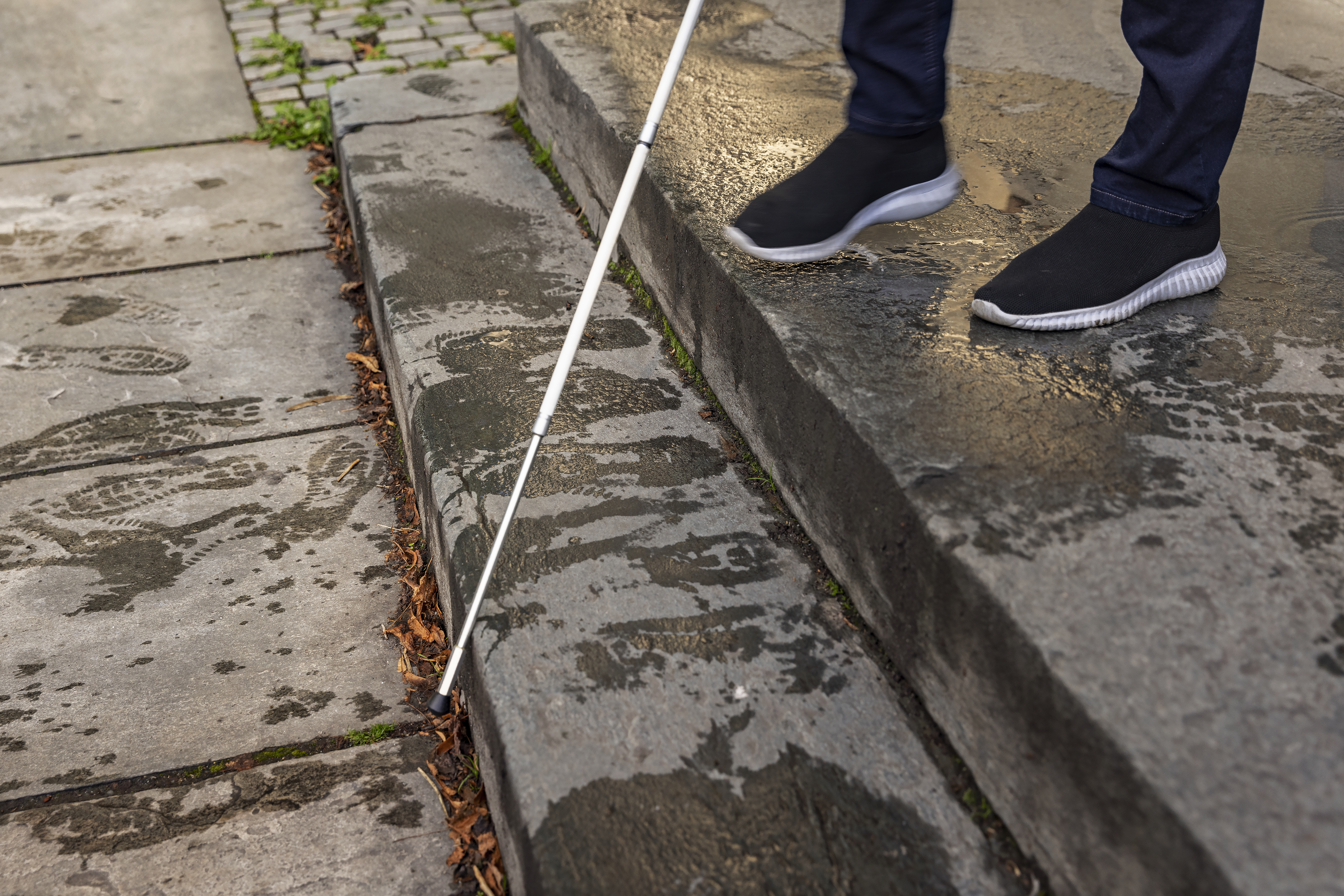 Mobilitetsstokk i trapp