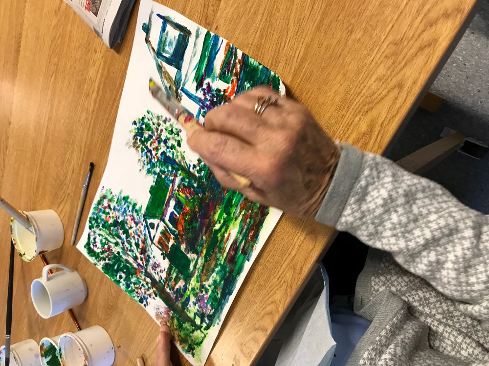 Pasient maler naturbilde