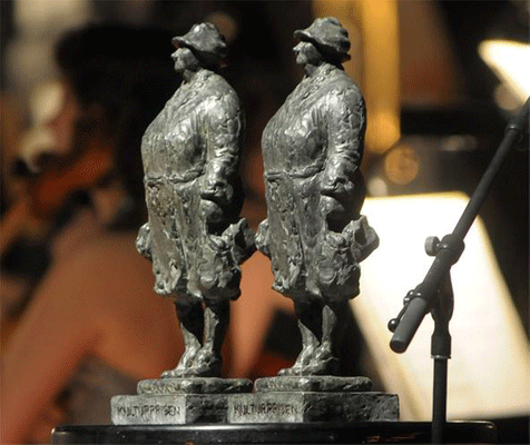 Statuetten &rdquo;Go`dagen&rdquo; laget av billedkunstneren Tone Thiis Schjetne.