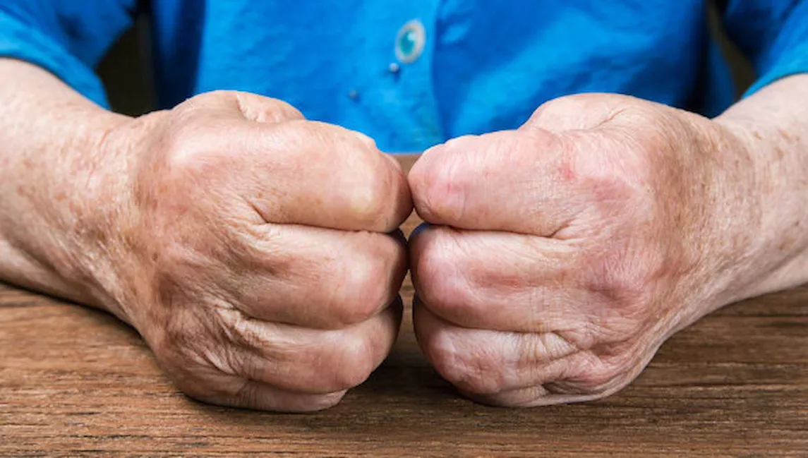 Photo of hands of an elderly person.